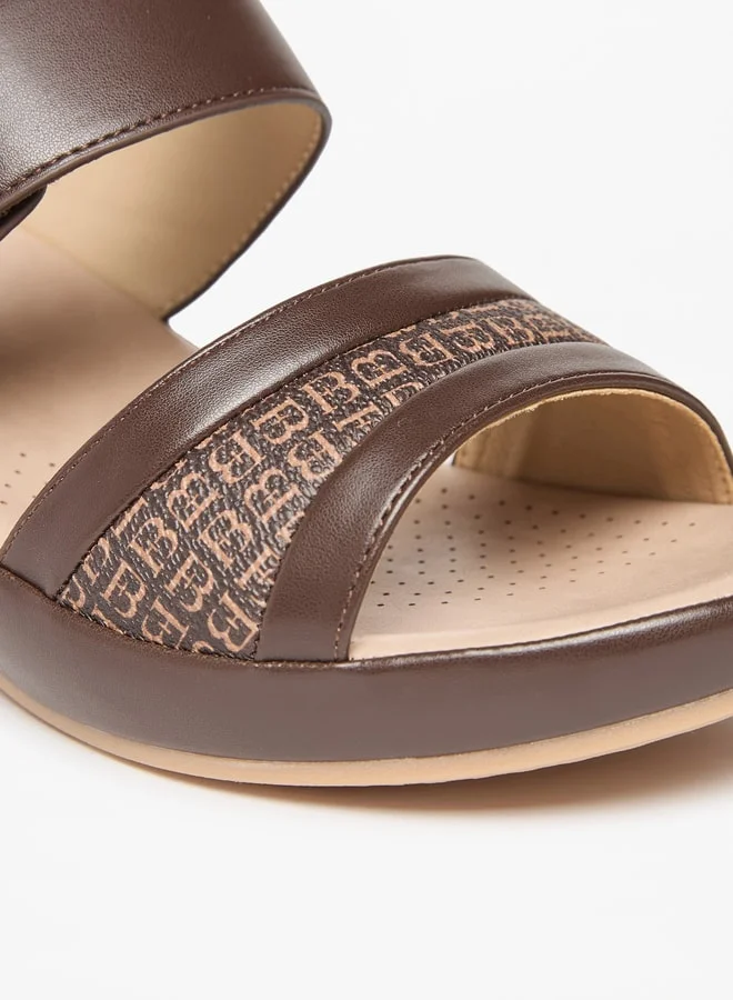 فلورا بيلا من شو إكسبرس Womens Monogram Print Slip-On Sandals With Platform Heels