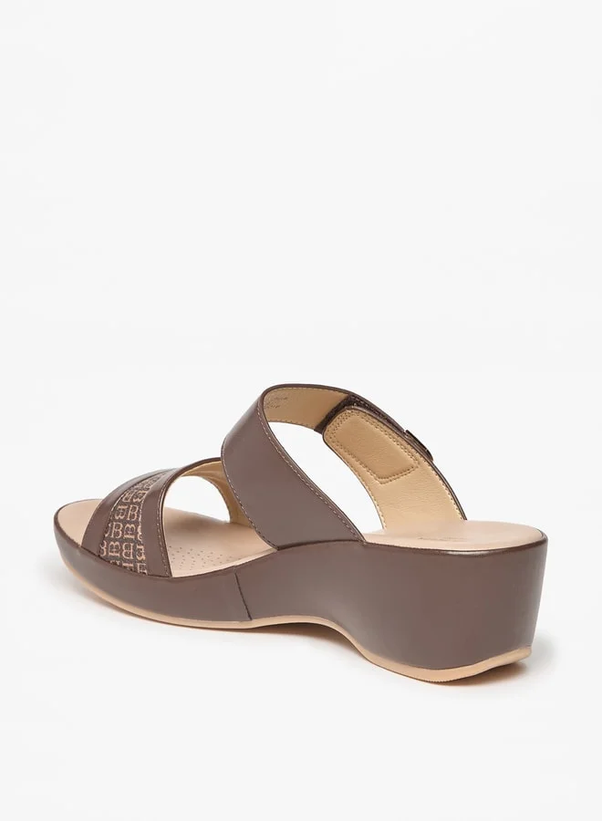 فلورا بيلا من شو إكسبرس Womens Monogram Print Slip-On Sandals With Platform Heels