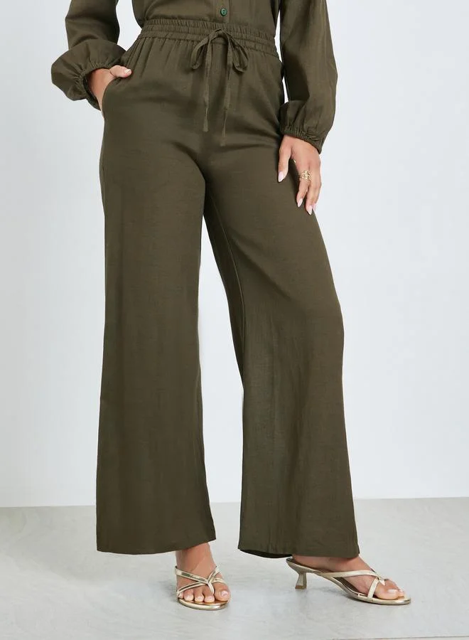 Styli Olive Solid Wide Leg Pants