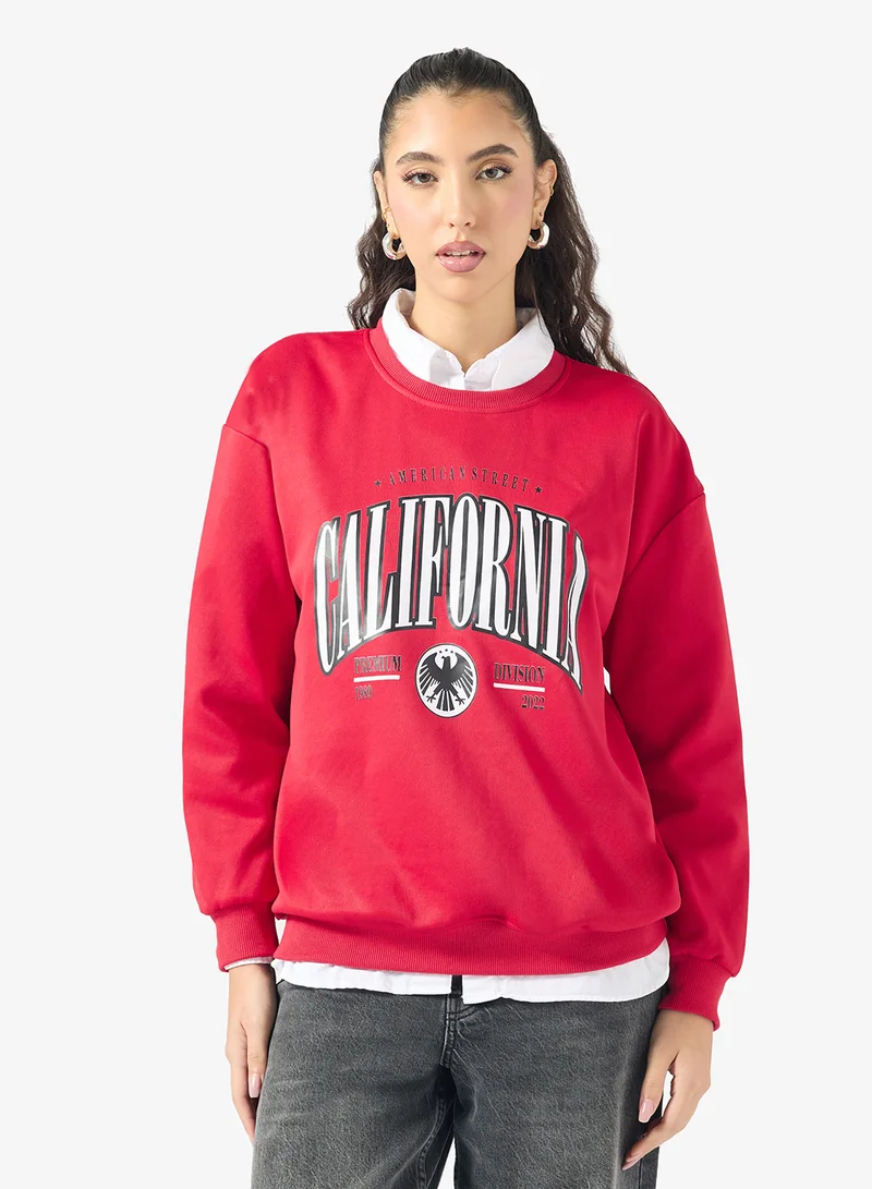 Ginger Oversize Varsity Graphic Sweatshirt