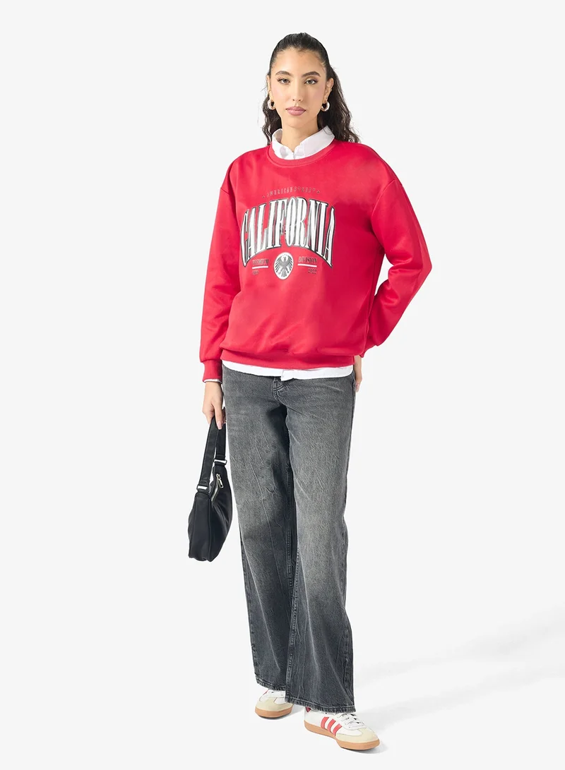 Ginger  Oversize Varsity Graphic Sweatshirt for Women | Best Price UAE