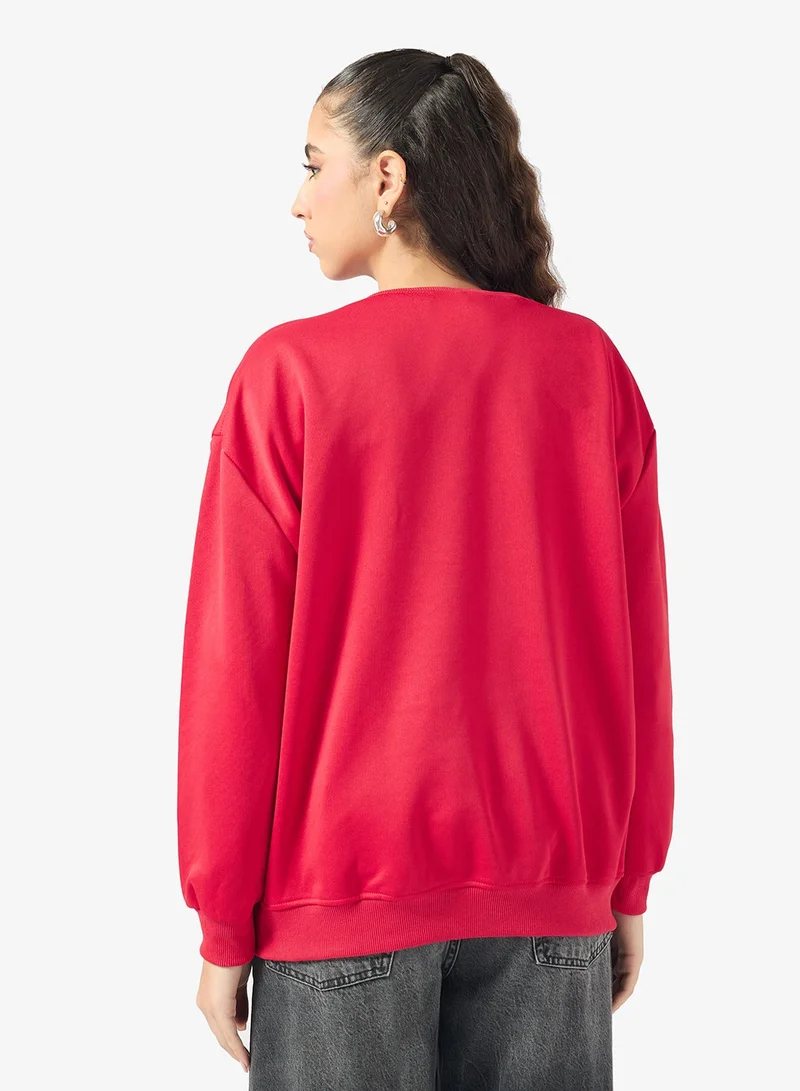 Ginger Oversize Varsity Graphic Sweatshirt