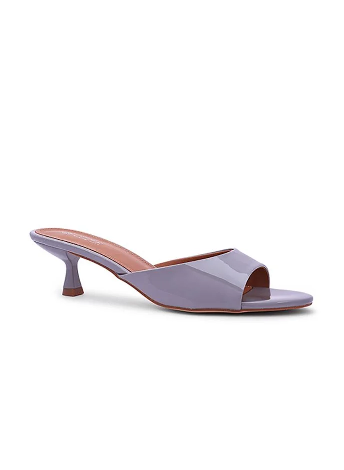 Elegant heel slippers designed for a chic look.