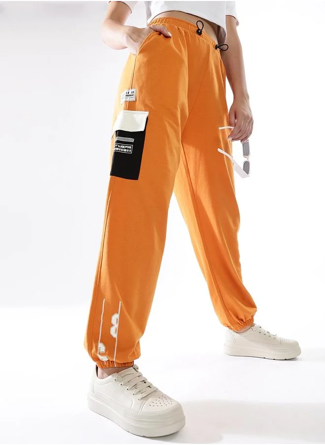 هوبرهولمي Women Track Pants in Multicolor featuring Jogger fit with a colourblocked pattern, no sleeves, regular length, secured with elasicated + drawstring closure, crafted from terry – an essential addition to your stylish collection.