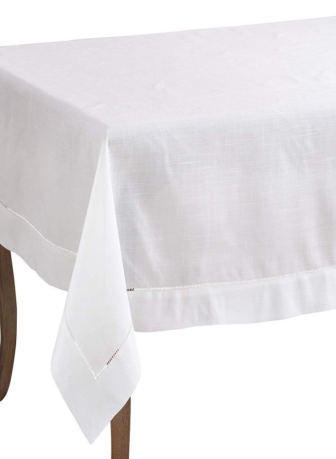 Fennco Styles Classic Solid Color Hemstitched Border Tablecloth for Dining Table, Banquet, Wedding, Family Dinne 70 x104 Inch, White - Image 1