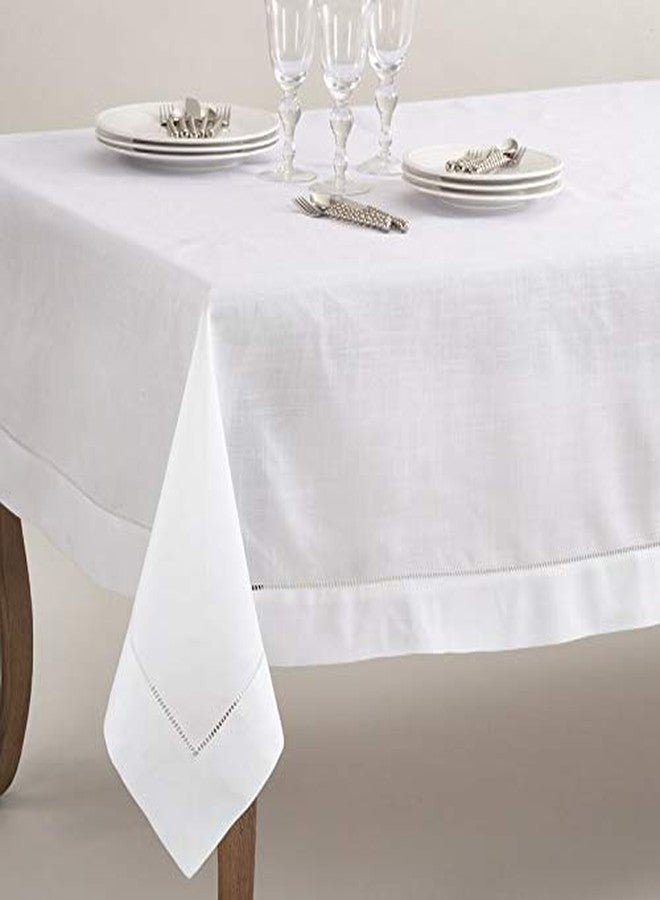 Fennco Styles Classic Solid Color Hemstitched Border Tablecloth for Dining Table, Banquet, Wedding, Family Dinne 70 x104 Inch, White - Image 4