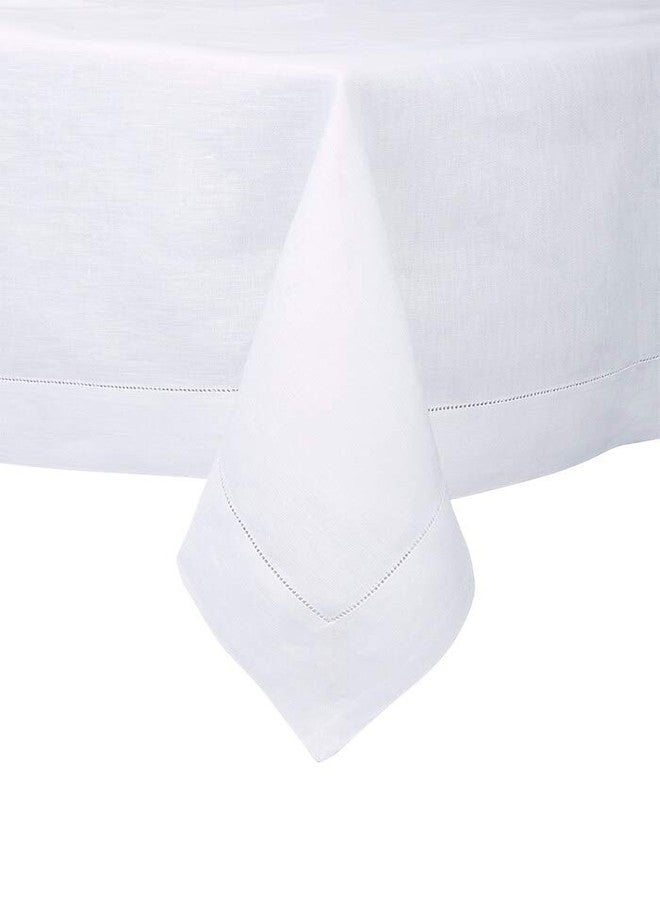 Fennco Styles Classic Solid Color Hemstitched Border Tablecloth for Dining Table, Banquet, Wedding, Family Dinne 70 x104 Inch, White - Image 3