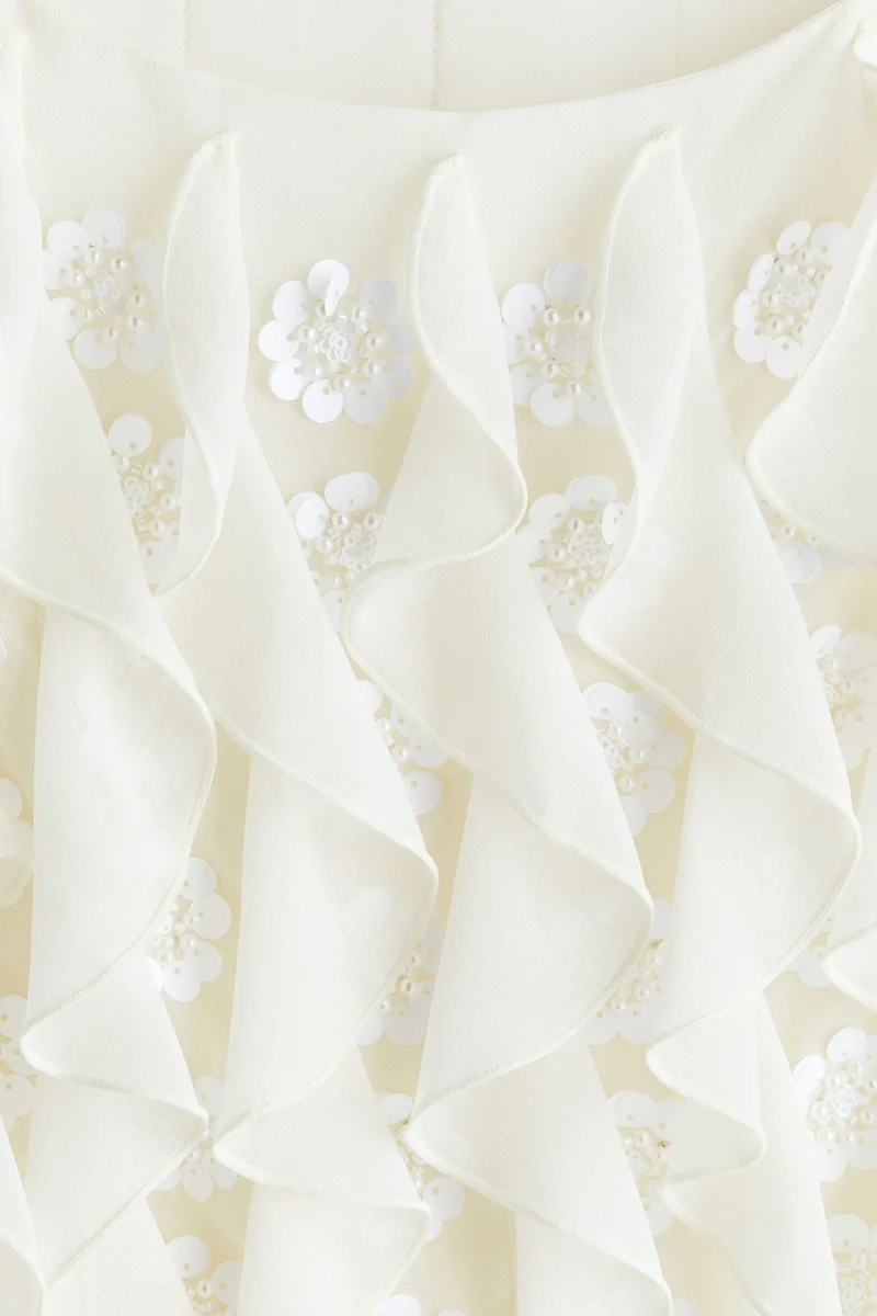 اتش اند ام بلوزة بدون أكمام بتصميم مزخرف