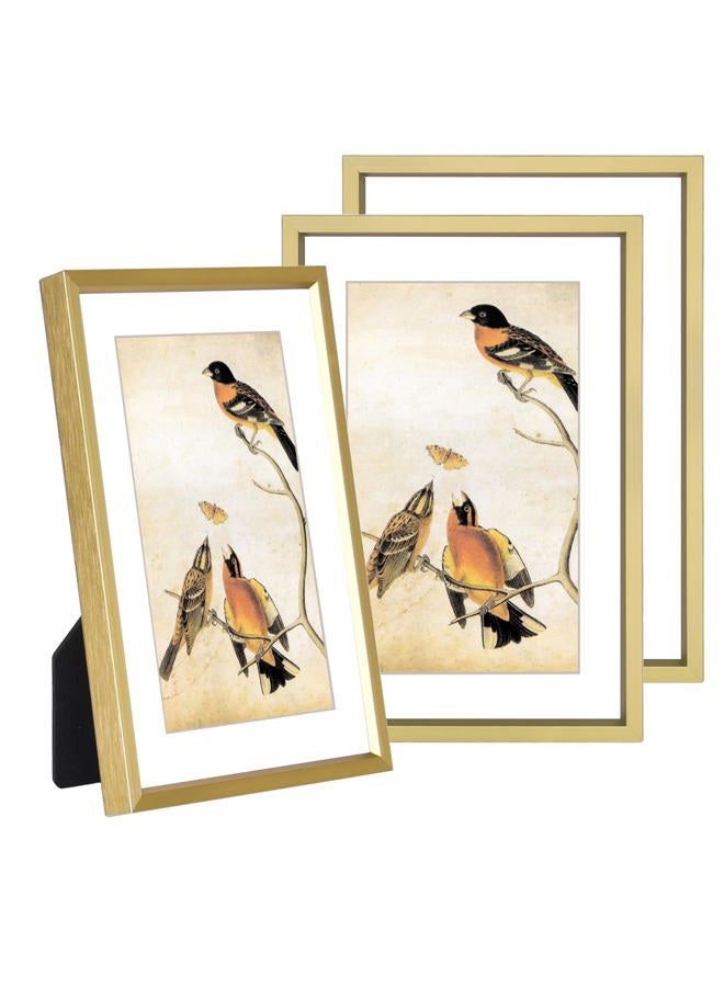 BKABOT 5x7 Picture Frame Set of 3, Brass Metal Photo Frames with HD Glass, Fits 4x6 with Mat or 5x7 without Mat, Wall Hanging and Table Display - Image 1