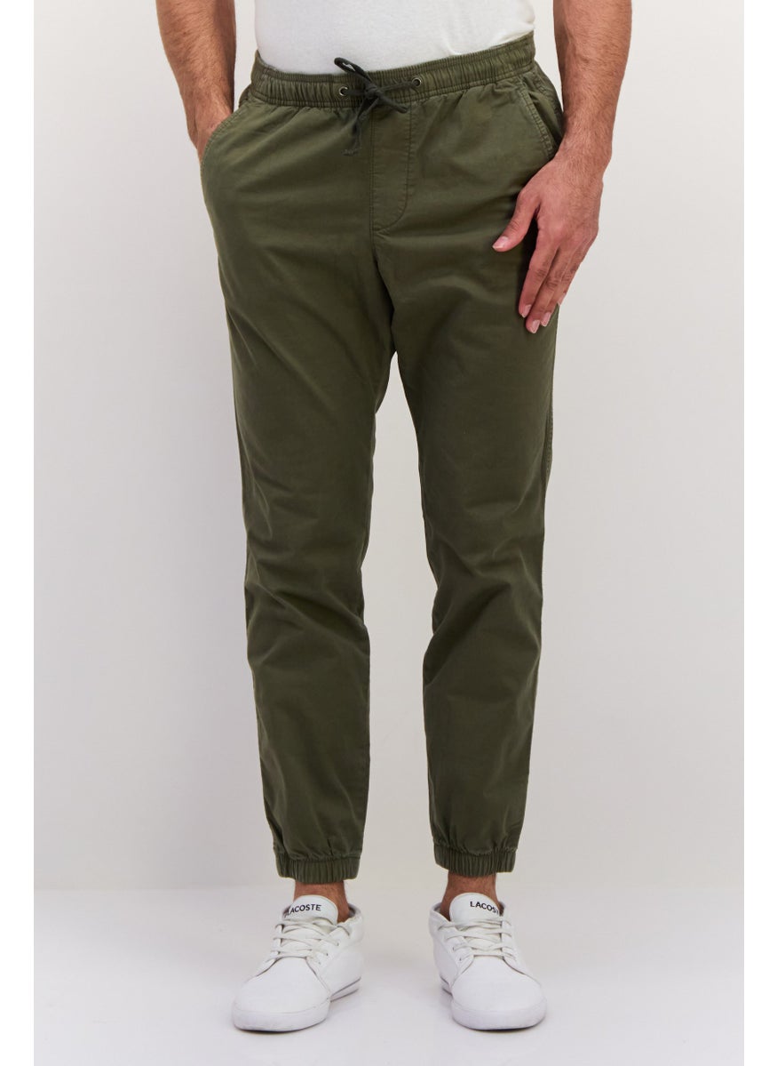 Men Regular Fit Solid Jogger Pants, Olive - pzsku/Z1832ECA206E20A3C56C4Z/45/_/1737642980/d29ee389-9db1-4d93-be65-4553f99b0253