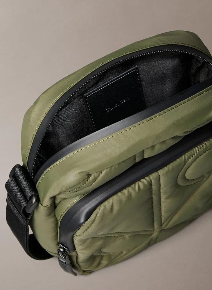 CALVIN KLEIN PUFFER REPORTER