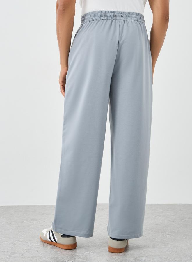 ستايلي بنطلون رياضي ستایلی رجالي رمادي بشعار ليجاسي مع رباط - Image 4