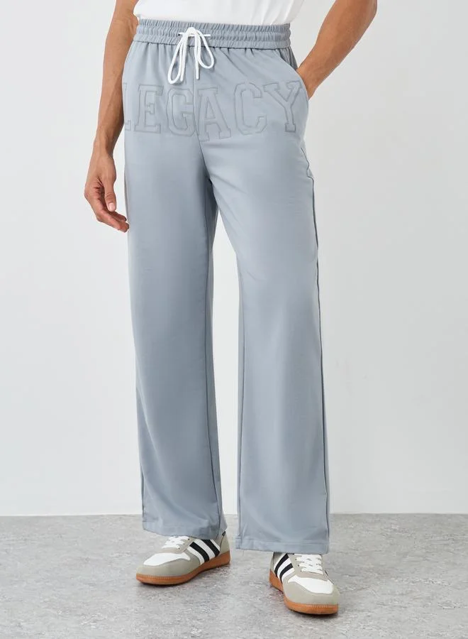 ستايلي Styli Men Grey Legacy Slogan Joggers with Drawstring