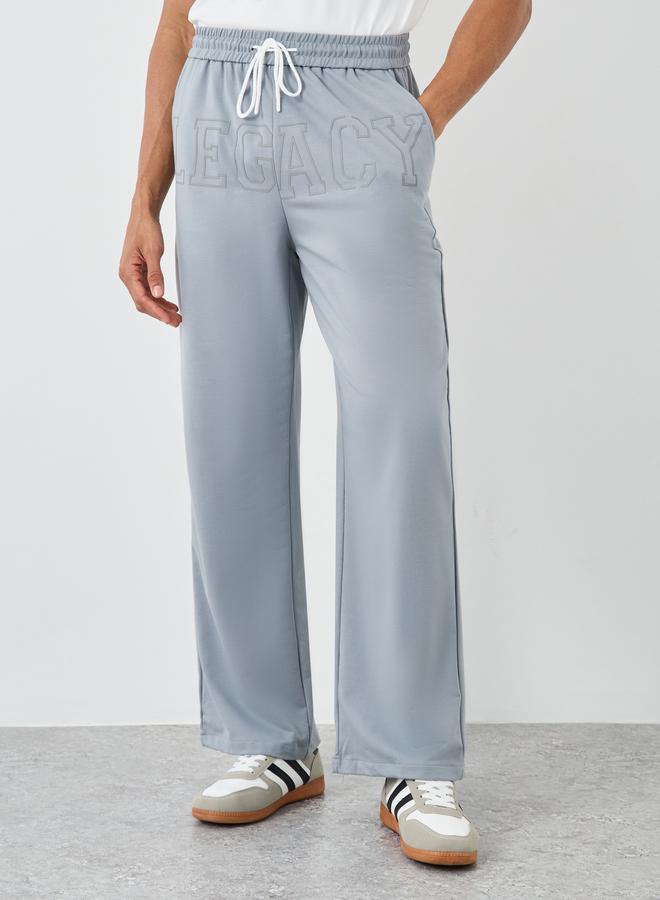 ستايلي بنطلون رياضي ستایلی رجالي رمادي بشعار ليجاسي مع رباط - Image 1