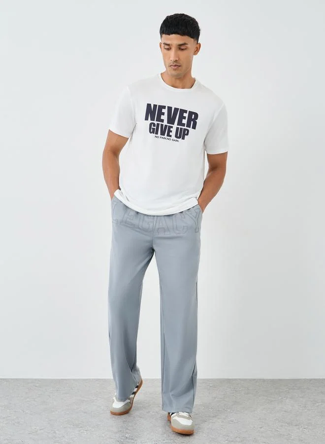 ستايلي Styli Men Grey Legacy Slogan Joggers with Drawstring