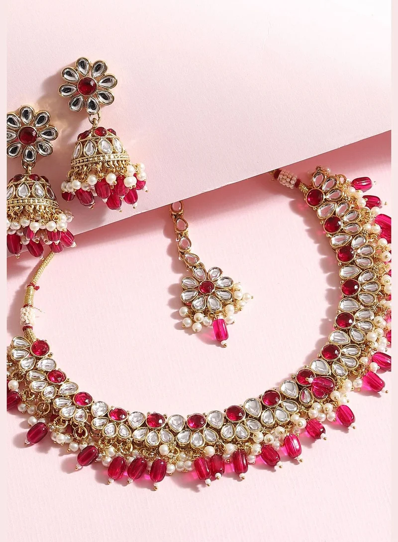 SOHI Gold Plated Designer Stone Party Necklace, Earring and Maang Tikka Set For Women