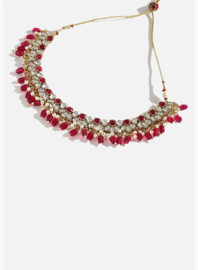 SOHI Gold Plated Designer Stone Party Necklace, Earring and Maang Tikka Set For Women
