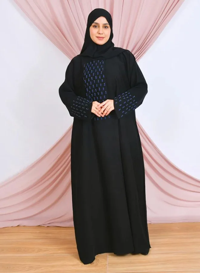 lamha abaya Black closed abaya with snap buttons, adorned with prominent navy blue embroidery