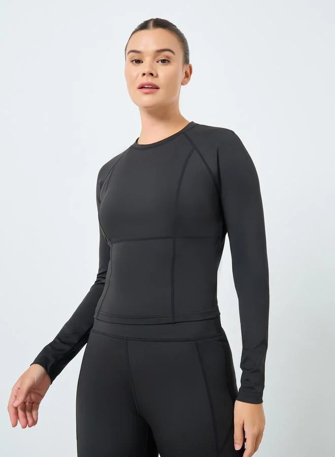 ستايلي اكتيف طقم بلوزة بأكمام طويلة وتفاصيل كونتور وفتحة إبهام مع بنطلون ضيق