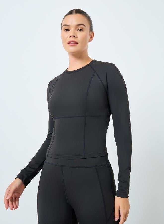 ستايلي اكتيف طقم بلوزة بأكمام طويلة وتفاصيل كونتور وفتحة إبهام مع بنطلون ضيق - Image 1