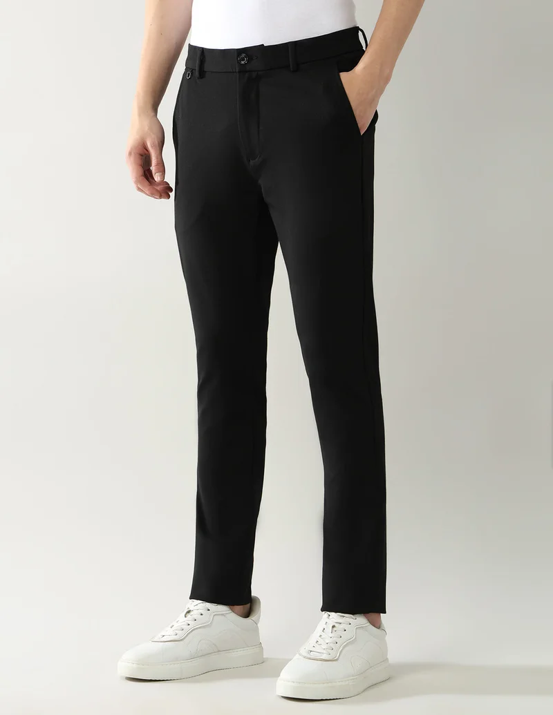 Arrow Black Slim Fit Knitted Autoflex Trousers for Men | Best Price UAE