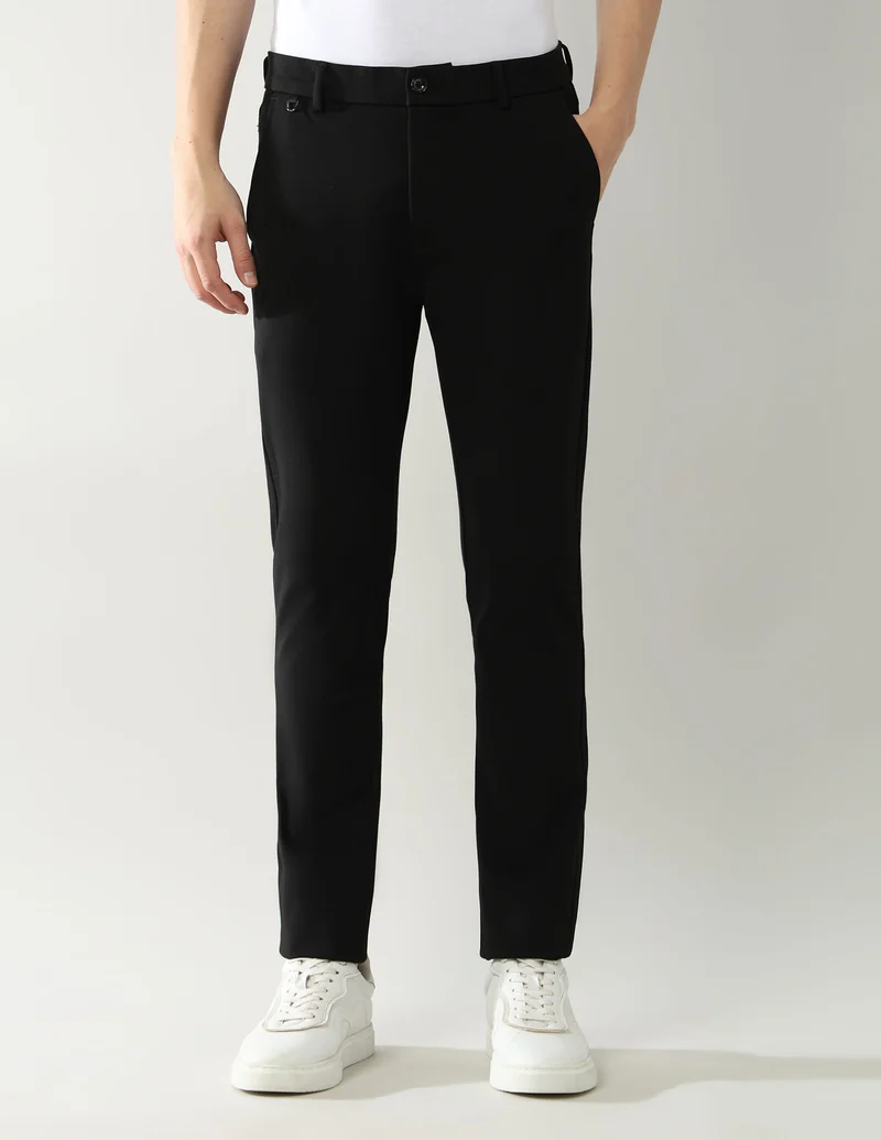 Arrow Black Slim Fit Knitted Autoflex Trousers for Men | Best Price UAE