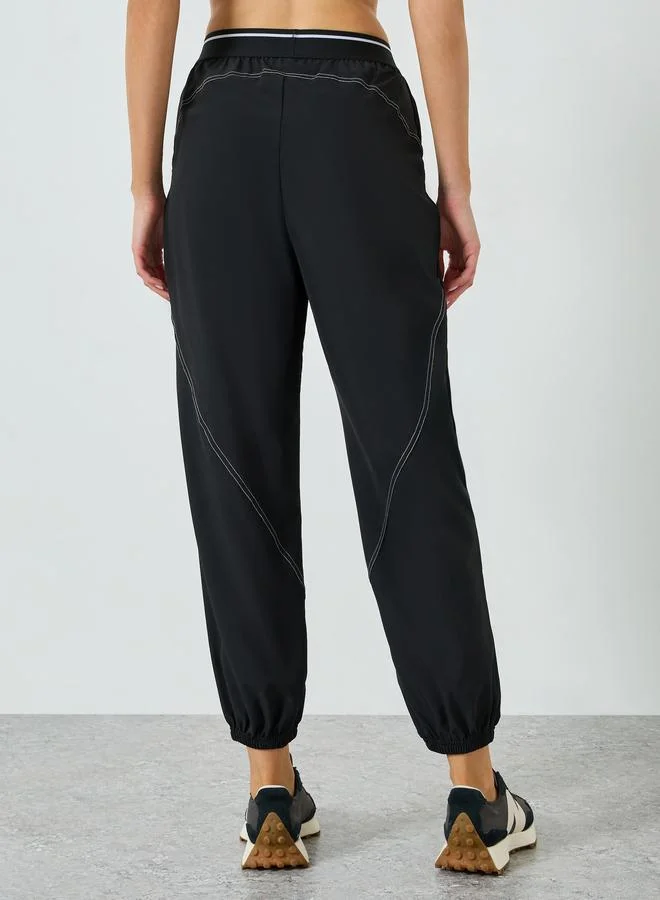 Styli Active  Contrast Stripe Waist Detail Joggers for Women | Best Price UAE