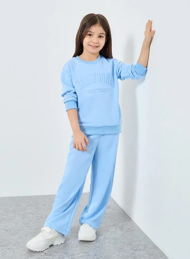 Styli Styli Girl Embossed Slogan Sweat Top and Wide Leg Jogger Set