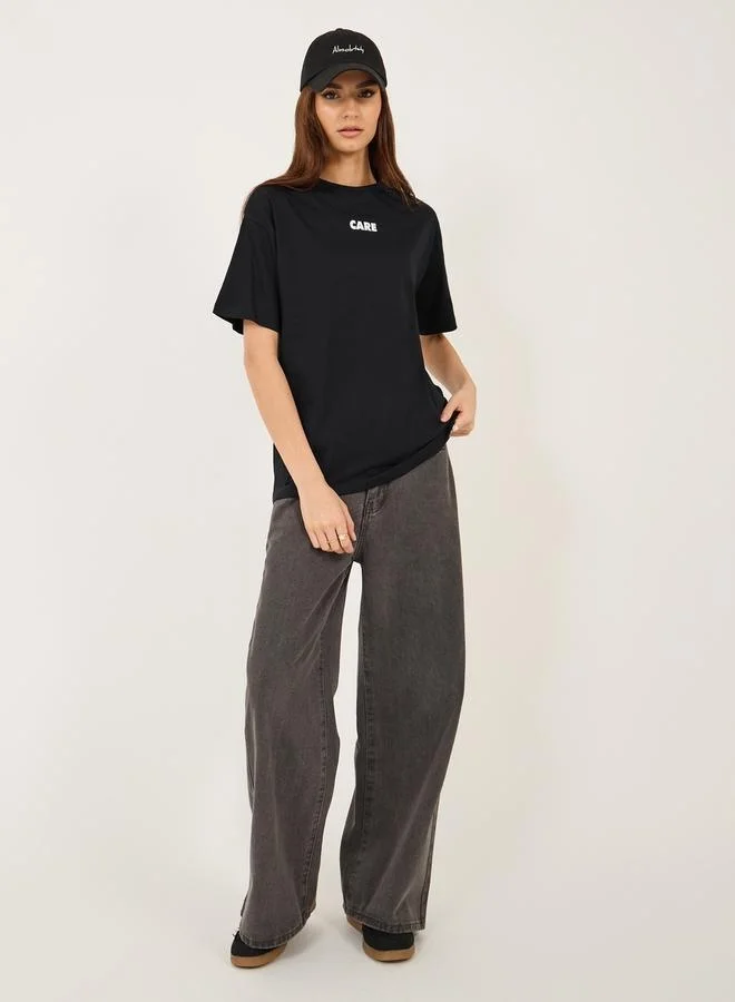 Styli Oversized Slogan Print Round Neck T-Shirt