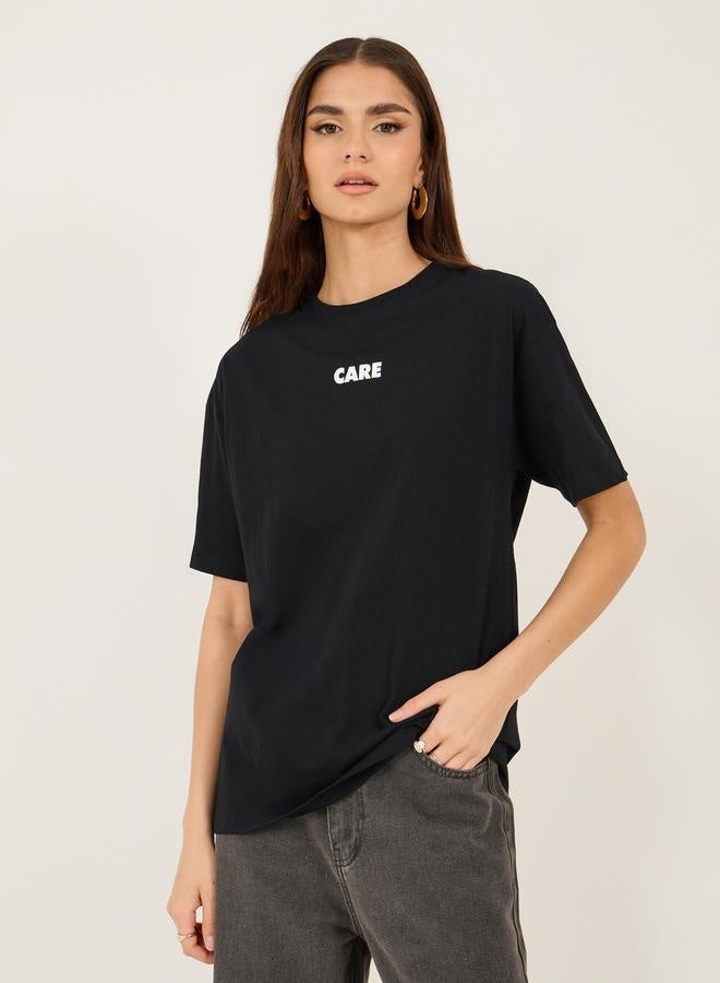Styli Oversized Slogan Print Round Neck T-Shirt - Image 1