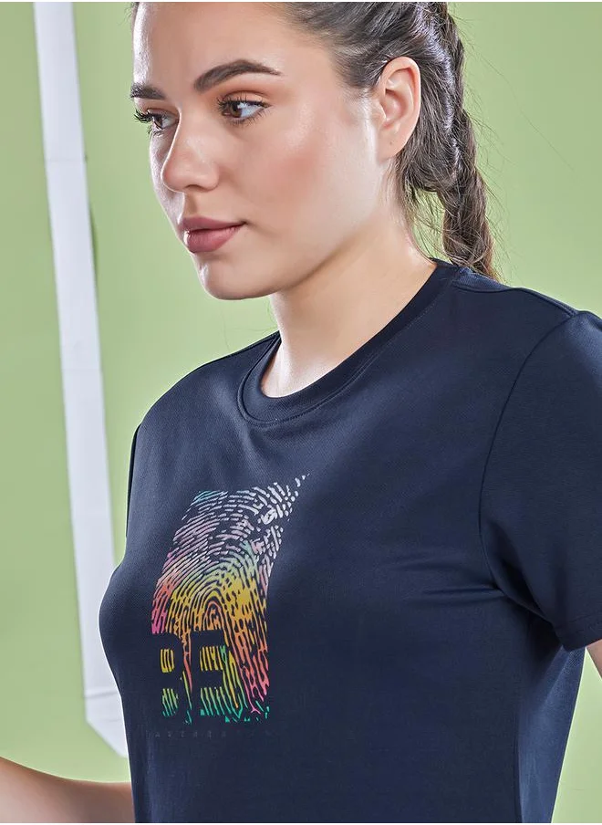 تكنوسبورت Graphic Print Crew Neck Short Sleeve Top by Styli