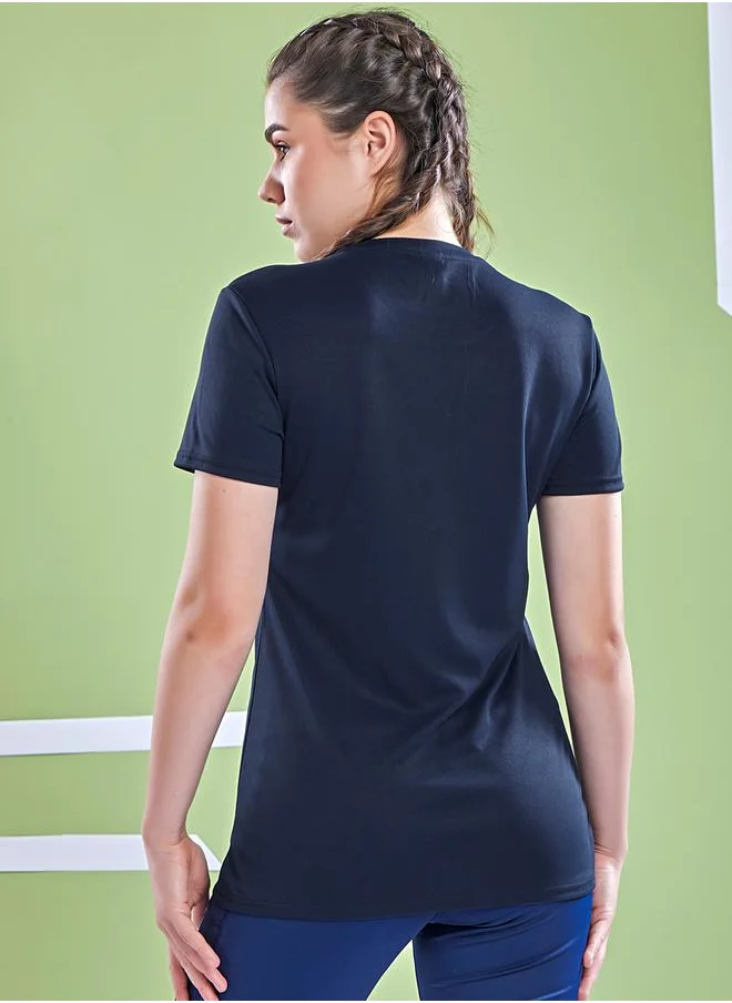 تكنوسبورت Graphic Print Crew Neck Short Sleeve Top by Styli