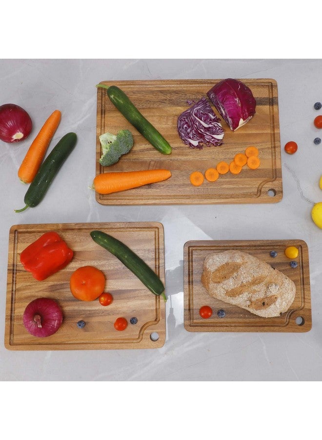 Caperci Acacia Wood Cutting Boards Set for Kitchen, Caperci Large Wooden Cutting Chopping Boards Set of 3 with Deep Juice Groove and Handle Hole for Meat, Veggies and Fruit (17x12, 14x11, 11x8 inch) - Image 4