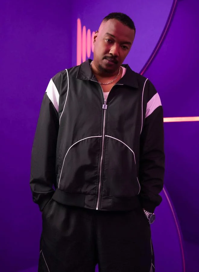 Styli Men Black Cut and Sew Panel Bomber Jacket