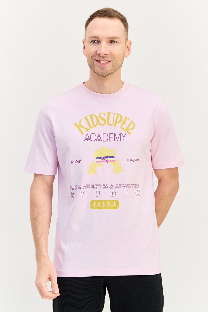 Puma X Kidsuper Men Sportswear Fit Short Sleeve Outdoor T-Shirt, Pink - Image 1