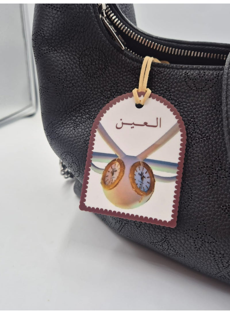 Passion District Bag hanging charm made of acrylic with Omega clock  design in alain city - Image 3
