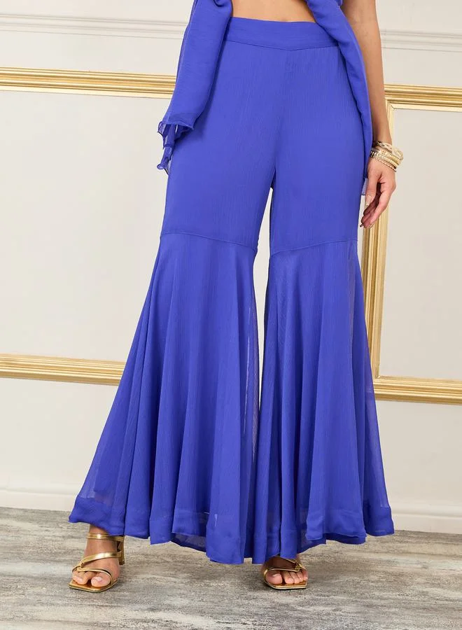 ستايلي Embellished Layer Ruffle Sleeves Peplum Top and Flared Pant Co-Ords