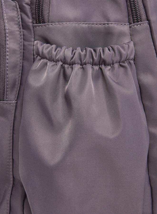 ستايلي حقيبة ظهر بتفاصيل لاصقة وجيوب خارجية - Image 4