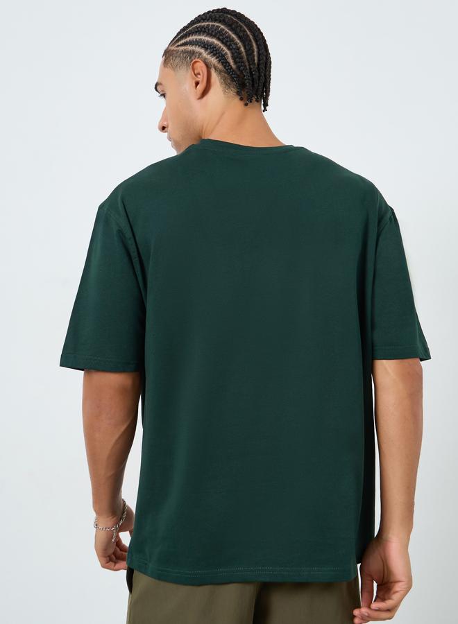 Styli Men Green Oasis Graphic Oversized T-Shirt - Image 4