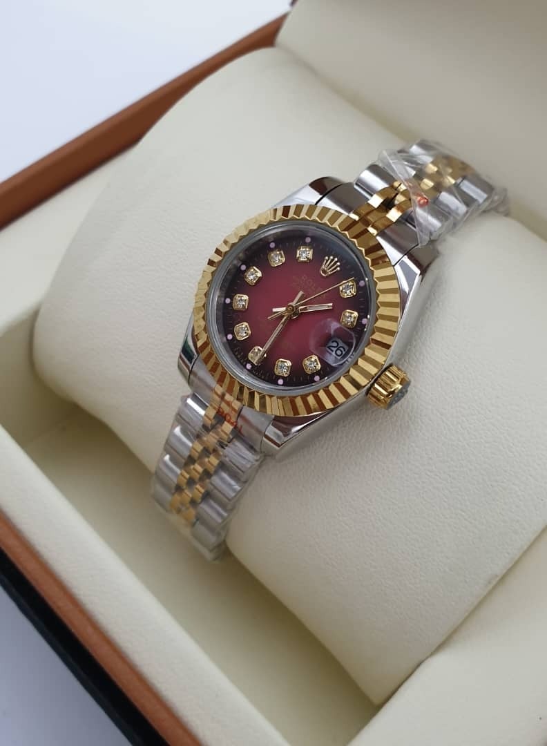 Rolex Women's watch with a soft red dial 