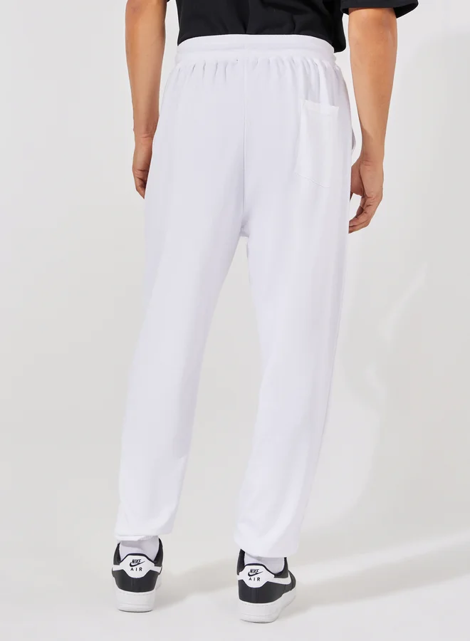 Styli Styli Teddy Placement Print Oversized Joggers with Drawcord