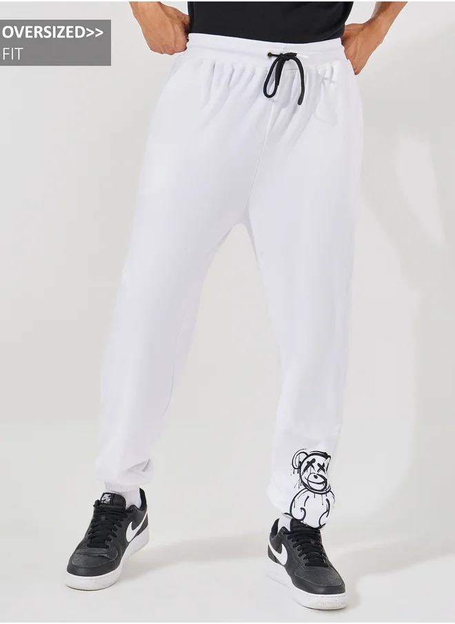 ستايلي Styli Teddy Placement Print Oversized Joggers with Drawcord