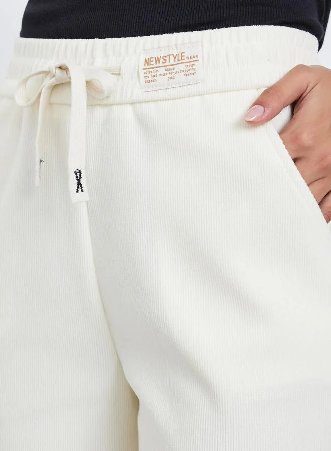 Styli Beige Solid Wide Leg Pants with Drawstring