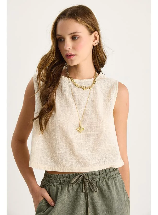 جينجر بلوزة فضفاضة من مزيج الكتان