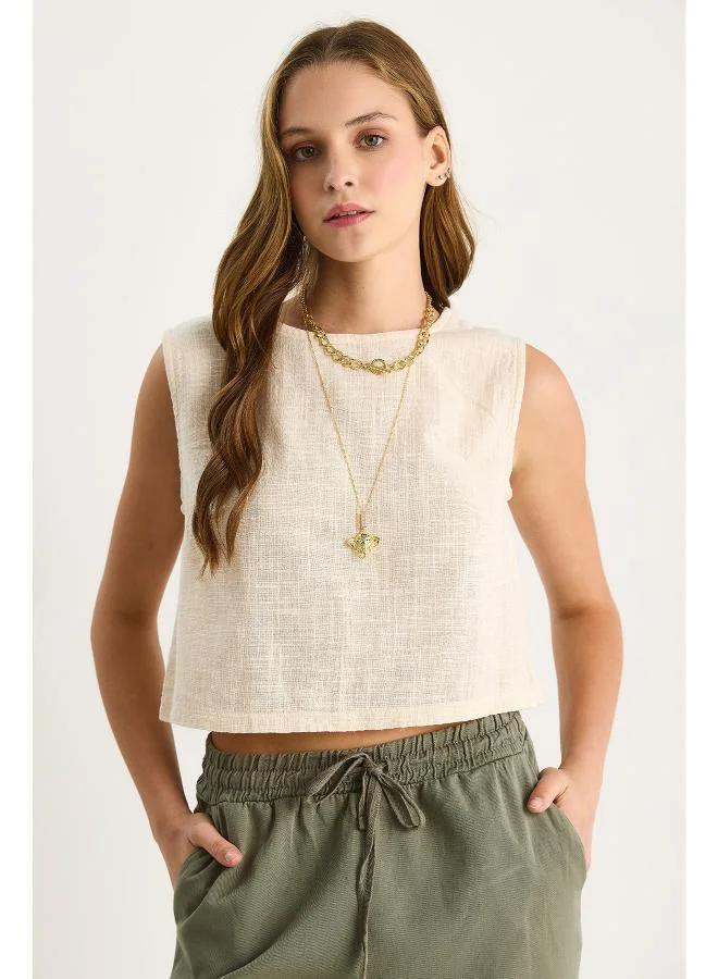 جينجر بلوزة فضفاضة من مزيج الكتان