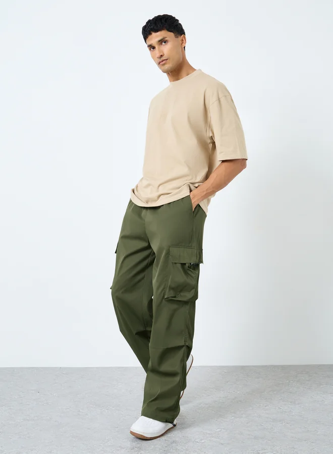 Styli Styli Men Olive Woven Oversized Cargo Joggers with Adjustable Loop