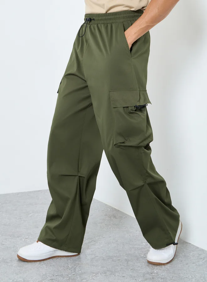 Styli Styli Men Olive Woven Oversized Cargo Joggers with Adjustable Loop