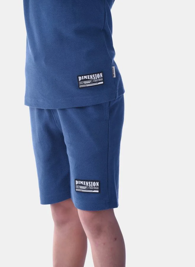 victor and jane Textured Badge Short Sleeve T-Shirt & Shorts Set by Styli