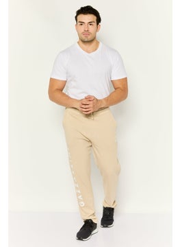 Men Regular Fit Drawstring Brand Logo Sweatpants, Beige - pzsku/Z18C5E27AEC4D9798BD25Z/45/_/1737642572/306c3690-6ba9-44d3-a856-317532a840ee