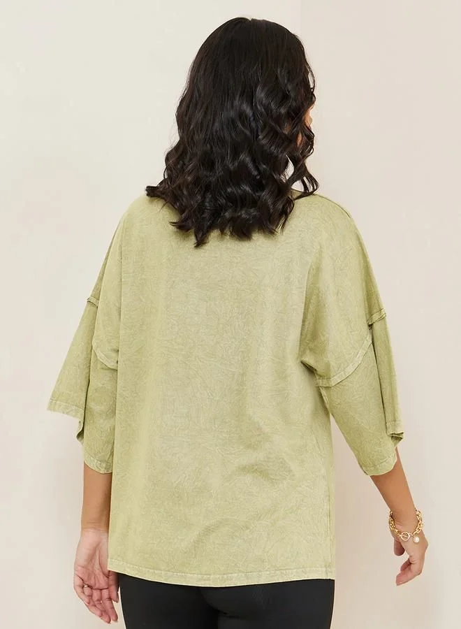 Styli Oversized Exaggerated Sleeve Washed T-Shirt with Exposed Seam